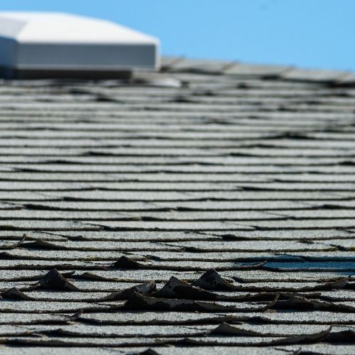 Common Roofing Issues in Plano Homes (And How We Fix Them) 3 A home with torn shingles